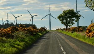 Wind farm in Scotland, Shutterstock. All sectors must shift to low or no carbon sources such as renewable energies.