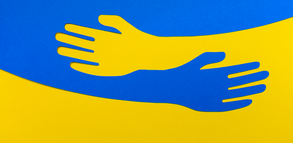 ukraine flag with hands
